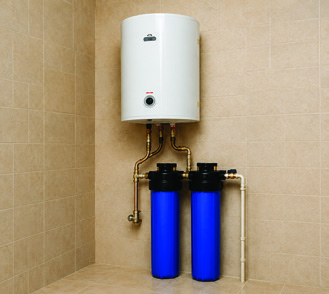 Domestic water heater plumbed in with dual filter cartridges